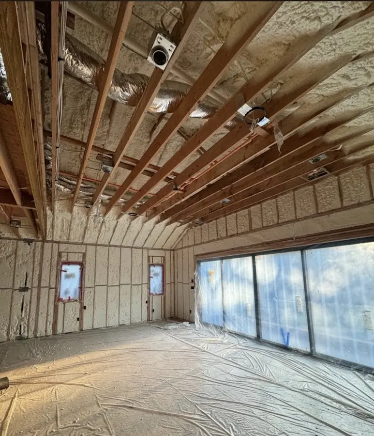 Interior walls and ceiling insulated with spray foam during new construction in Rittman